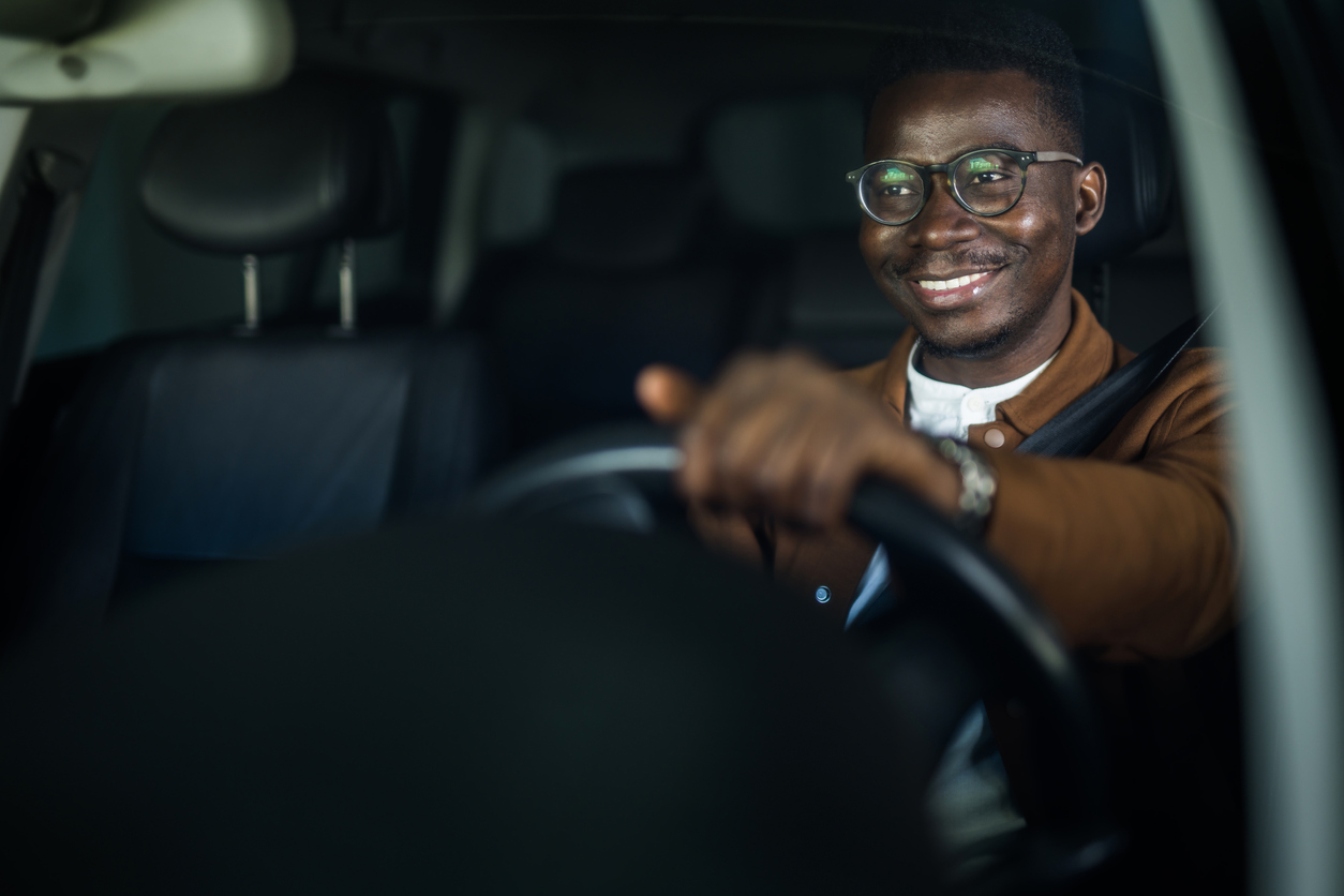 cheerful-young-man-enjoys-driving-his-car-don-moore-automotive